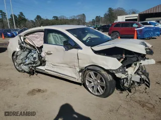 2012 Buick LaCrosse Leather with VIN 1G4GC5E30CF367693, listed as a Copart auction lot 47302355 with 275,089 mi miles and Salvage Title. Bid and sale history available at carsss.com. Image 4.