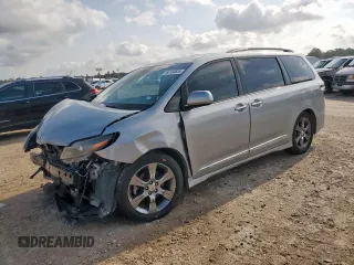 2015 Toyota Sienna SE with VIN 5TDXK3DC0FS636468, listed as a Copart auction lot 60164835 with 146,390 mi miles and Salvage title. Bid and sale history available at DreamBid. Image 1.