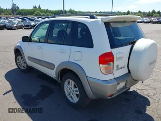2001 Toyota RAV4 with VIN JTEGH20V610012097, listed as a IAAI auction lot 42652021 with 168,152 mi miles and . Bid and sale history available at DreamBid. Image 3.