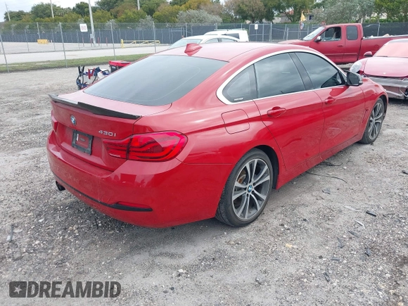 2019 BMW 4 Series 430i with VIN WBA4J1C52KBM16194, listed as a IAAI auction lot 41985890 with 74,788 mi miles and . Bid and sale history available at carsss.com. Image 4.