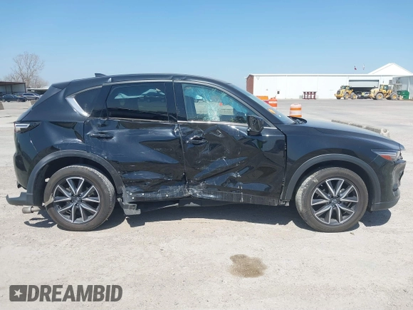 2018 Mazda CX-5 Grand Touring with VIN JM3KFADM8J0330035, listed as a IAAI auction lot 41878680 with 62,632 mi miles. Bid and sale history available at carsss.com. Image 14.