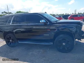 2015 Chevrolet Tahoe LTZ with VIN 1GNSCCKC7FR746028, listed as a IAAI auction lot 41674775 with 198,067 mi miles. Bid and sale history available at carsss.com. Image 14.