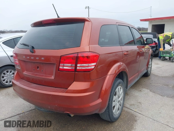 2014 Dodge Journey American Value Pkg with VIN 3C4PDCAB7ET258997, listed as a IAAI auction lot 41375834 with 230,868 mi miles. Bid and sale history available at carsss.com. Image 4.
