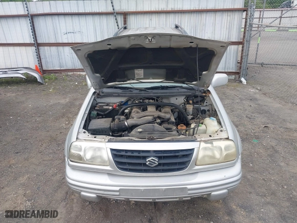 2000 Suzuki Grand Vitara JLX with VIN JS3TD62V5Y4117740, listed as a IAAI auction lot 42088696 with 166,484 mi miles. Bid and sale history available at carsss.com. Image 10.