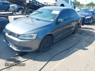 2014 Volkswagen Jetta S with VIN 3VW2K7AJ8EM231345, listed as a IAAI auction lot 42583321 with 129,988 mi miles and . Bid and sale history available at DreamBid. Image 2.
