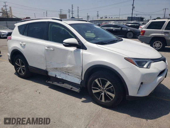 2018 Toyota RAV4 XLE with VIN JTMWFREVXJD118021, listed as a Copart auction lot 58845805 with 108,068 mi miles and Salvage title. Bid and sale history available at DreamBid. Image 4.