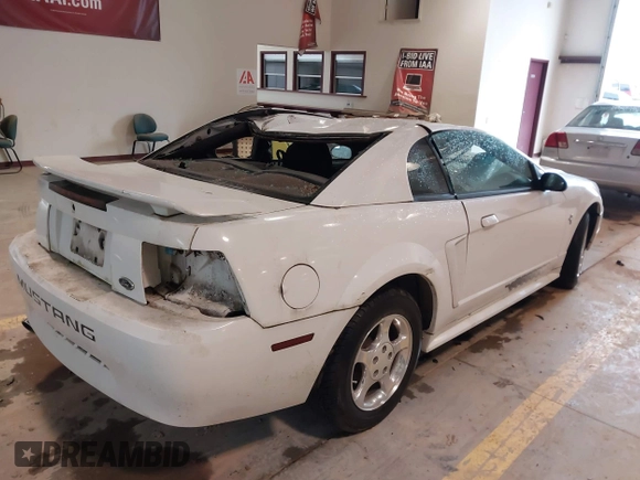 2003 Ford Mustang Standard with VIN 1FAFP40493F381211, listed as a IAAI auction lot 41814640 with 312,991 mi miles. Bid and sale history available at carsss.com. Image 4.