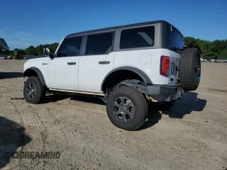 2023 Ford Bronco z VIN 1FMEE5BP7PLC16799, wystawiony jako Copart lot #57847955 z przebiegiem 11 980 mil mil oraz Czysty tytuł • Clean title. Historia ofert i sprzedaży dostępna na DreamBid. Obrazek 2.