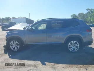 2021 Volkswagen Atlas SE z VIN 1V2WR2CA3MC602149, wystawiony jako IAAI lot #41845288 z przebiegiem 59 941 mil mil oraz . Historia ofert i sprzedaży dostępna na DreamBid. Obrazek 13.