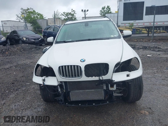 2013 BMW X5 xDrive35i z VIN 5UXZV4C53D0E14968, wystawiony jako IAAI lot #42253469 z przebiegiem 53 562 mil mil oraz . Historia ofert i sprzedaży dostępna na DreamBid. Obrazek 13.
