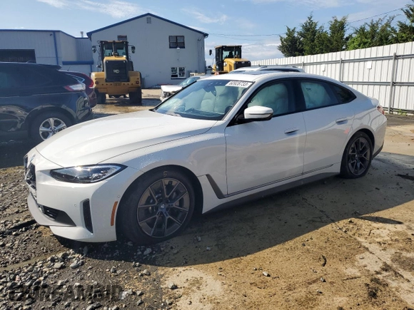 2023 BMW i4 eDrive40 with VIN WBY73AW04PFP24525, listed as a Copart auction lot 60928733 with 13,618 mi miles. Bid and sale history available at carsss.com. Image 1.