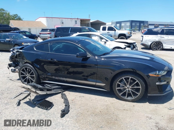 2021 Ford Mustang EcoBoost with VIN 1FA6P8TH1M5137372, listed as a IAAI auction lot 42031716 with 58,475 mi miles and . Bid and sale history available at DreamBid. Image 14.