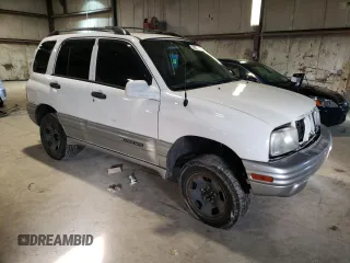 2002 Chevrolet Tracker LT z VIN 2CNBJ634126927635, wystawiony jako Copart lot #78814333 z przebiegiem 224 726 mil mil oraz Szkoda całkowita • Salvage title. Historia ofert i sprzedaży dostępna na DreamBid. Obrazek 4.