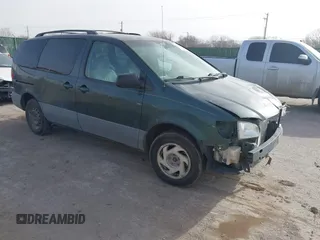 1999 Toyota Sienna LE with VIN 4T3ZF13C0XU134191, listed as a IAAI auction lot 41792970 with 155,152 mi miles. Bid and sale history available at carsss.com. Image 1.