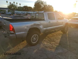 2014 Toyota Tacoma PreRunner with VIN 3TMKU4HNXEM041311, listed as a Copart auction lot 84065684 with 212,473 mi miles and Salvage title. Bid and sale history available at DreamBid. Image 3.