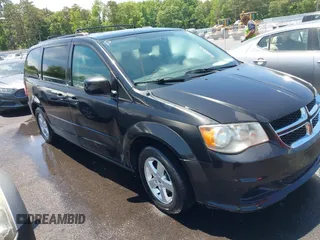 2012 Dodge Grand Caravan SXT with VIN 2C4RDGCG8CR247824, listed as a IAAI auction lot 42210397 with 200,919 mi miles and . Bid and sale history available at DreamBid. Image 1.