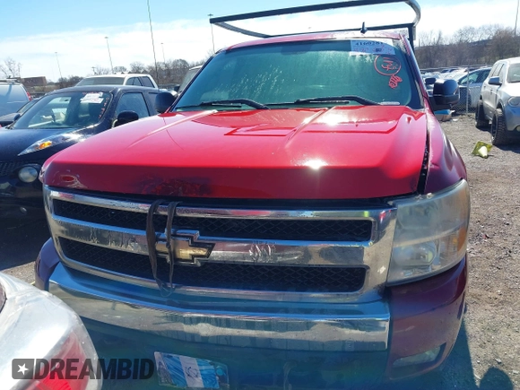2007 Chevrolet Silverado 1500 LT w/1LT with VIN 2GCEC19C071686992, listed as a IAAI auction lot 41602817 with 395,297 mi miles. Bid and sale history available at carsss.com. Image 12.