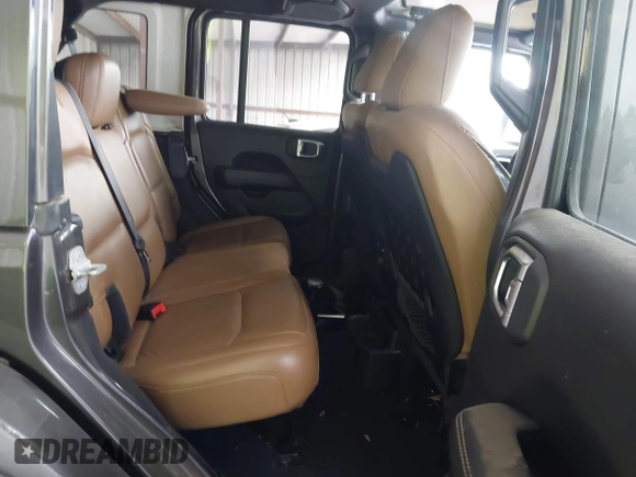 2021 Jeep Wrangler Unlimited Rubicon with VIN 1C4JJXFM6MW538774, listed as a IAAI auction lot 42368651 with 49,490 mi miles and . Bid and sale history available at DreamBid. Image 8.