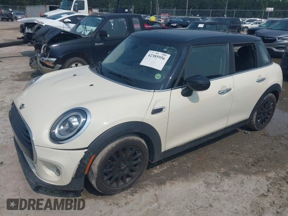 2020 MINI Hardtop 4 Door Cooper with VIN WMWXU7C01L2M54710, listed as a IAAI auction lot 42385956 with 55,714 mi miles and . Bid and sale history available at DreamBid. Image 2.