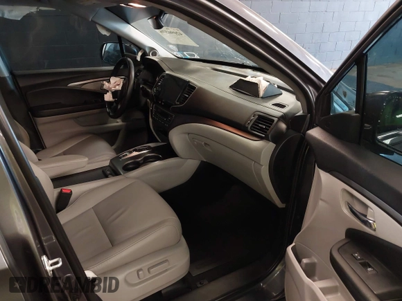 2022 Honda Pilot EX-L with VIN 5FNYF6H59NB000754, listed as a IAAI auction lot 42090576 with 32,813 mi miles and . Bid and sale history available at DreamBid. Image 5.