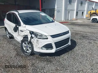 2014 Ford Escape SE z VIN 1FMCU0GX6EUE46539, wystawiony jako IAAI lot #42327132 z przebiegiem 75 735 mil mil oraz . Historia ofert i sprzedaży dostępna na DreamBid. Obrazek 1.