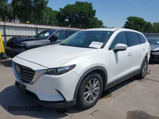 2019 Mazda CX-9 Touring z VIN JM3TCBCY2K0300702, wystawiony jako IAAI lot #42194050 z przebiegiem 98 247 mil mil oraz . Historia ofert i sprzedaży dostępna na DreamBid. Obrazek 19.