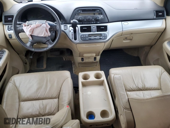 2010 Honda Odyssey EX-L with VIN 5FNRL3H62AB007415, listed as a Copart auction lot 52200245 with 184,601 mi miles and Salvage Title. Bid and sale history available at DreamBid. Image 8.
