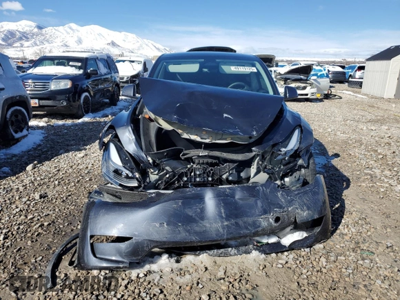 2024 Tesla Model Y Long Range z VIN 7SAYGDEEXRA222408, wystawiony jako Copart lot #49119125 z przebiegiem 20 773 mil mil oraz Szkoda całkowita • Salvage title. Historia ofert i sprzedaży dostępna na DreamBid. Obrazek 5.
