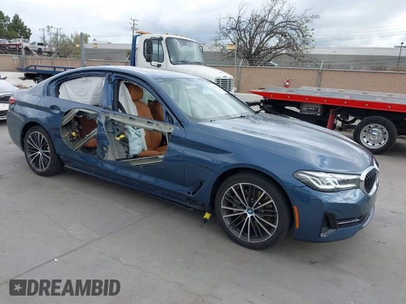 2023 BMW 5 Series 530e z VIN WBA13AG07PCL21918, wystawiony jako IAAI lot #41890108 z przebiegiem 20 790 mil mil oraz . Historia ofert i sprzedaży dostępna na DreamBid. Obrazek 1.