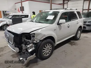 2009 Mercury Mariner Premier z VIN 4M2CU87779KJ14155, wystawiony jako IAAI lot #41520138 z przebiegiem 175 980 mil mil oraz . Historia ofert i sprzedaży dostępna na DreamBid. Obrazek 2.