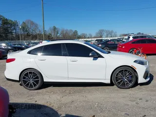 2021 BMW 2 Series M235i xDrive with VIN WBA13AL06M7G61056, listed as a IAAI auction lot 41140205 with 49,413 mi miles and . Bid and sale history available at DreamBid. Image 13.