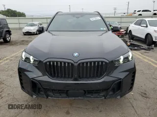 2024 BMW X5 xDrive50e with VIN 5UX43EU02R9U91727, listed as a Copart auction lot 64155574 with 7,050 mi miles and Salvage Title. Bid and sale history available at carsss.com. Image 5.