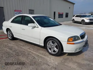 2002 Lincoln LS w/Base Pkg with VIN 1LNHM87A42Y678142, listed as a IAAI auction lot 41506503 with 196,588 mi miles. Bid and sale history available at carsss.com. Image 1.