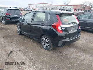 2016 Honda Fit EX with VIN JHMGK5H74GX046003, listed as a IAAI auction lot 41866954 with 64,638 mi miles and . Bid and sale history available at DreamBid. Image 3.