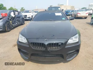 2014 BMW M6 z VIN WBSLZ9C5XEDZ78402, wystawiony jako IAAI lot #42399055 z przebiegiem 127 803 mil mil oraz . Historia ofert i sprzedaży dostępna na DreamBid. Obrazek 12.