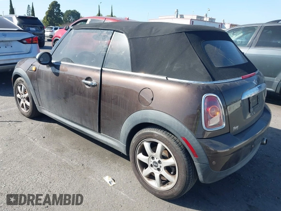 2010 MINI Convertible with VIN WMWMR3C50ATU97550, listed as a IAAI auction lot 41709012 with 86,499 mi miles and . Bid and sale history available at DreamBid. Image 3.