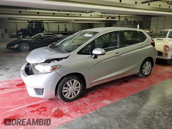 2016 Honda Fit LX with VIN JHMGK5H50GX005947, listed as a Copart auction lot 57699275 with 103,698 mi miles and Salvage title. Bid and sale history available at DreamBid. Image 1.