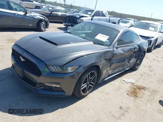 2015 Ford Mustang V6 with VIN 1FA6P8AM8F5329519, listed as a IAAI auction lot 42226971 with 108,730 mi miles and . Bid and sale history available at DreamBid. Image 2.