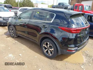 2020 Kia Sportage LX with VIN KNDPM3AC7L7755719, listed as a IAAI auction lot 42026994 with 49,537 mi miles and . Bid and sale history available at DreamBid. Image 3.