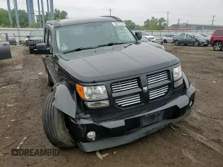 2011 Dodge Nitro Heat with VIN 1D4PT4GK7BW597557, listed as a Copart auction lot 58973335 with 180,958 mi miles and Salvage title. Bid and sale history available at DreamBid. Image 13.