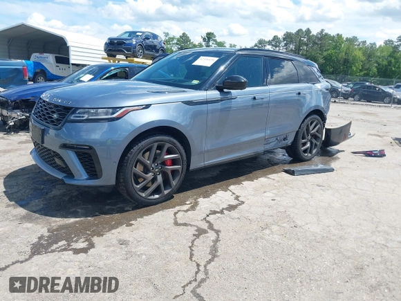 2020 Land Rover Range Rover Velar z VIN SALYU2EE1LA258140, wystawiony jako IAAI lot #42326439 z przebiegiem 61 827 mil mil oraz . Historia ofert i sprzedaży dostępna na DreamBid. Obrazek 17.