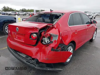 2009 Volkswagen Jetta Sedan SE with VIN 3VWRM71K99M123288, listed as a IAAI auction lot 41892948 with 345,159 mi miles. Bid and sale history available at carsss.com. Image 6.