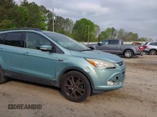 2013 Ford Escape SEL with VIN 1FMCU0HX1DUD56986, listed as a IAAI auction lot 42026927 with 180,318 mi miles. Bid and sale history available at carsss.com. Image 6.