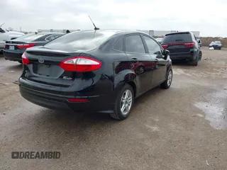 2019 Ford Fiesta SE z VIN 3FADP4BJ7KM158142, wystawiony jako IAAI lot #41510806 z przebiegiem 55 315 mil mil oraz . Historia ofert i sprzedaży dostępna na DreamBid. Obrazek 4.