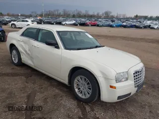 2009 Chrysler 300 LX with VIN 2C3KA43D09H508381, listed as a IAAI auction lot 41834673 with 112,152 mi miles. Bid and sale history available at carsss.com. Image 1.