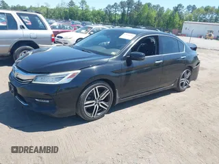2016 Honda Accord Touring with VIN 1HGCR3F93GA036152, listed as a IAAI auction lot 42134354 with 233,311 mi miles and . Bid and sale history available at DreamBid. Image 2.