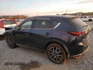 2018 Mazda CX-5 Grand Touring with VIN JM3KFBDM9J1326933, listed as a Copart auction lot 82180164 with 99,574 mi miles and Salvage title. Bid and sale history available at DreamBid. Image 2.
