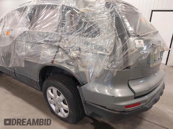 2011 Honda CR-V SE with VIN JHLRE4H42BC006698, listed as a IAAI auction lot 41099185 with 99,352 mi miles. Bid and sale history available at carsss.com. Image 13.