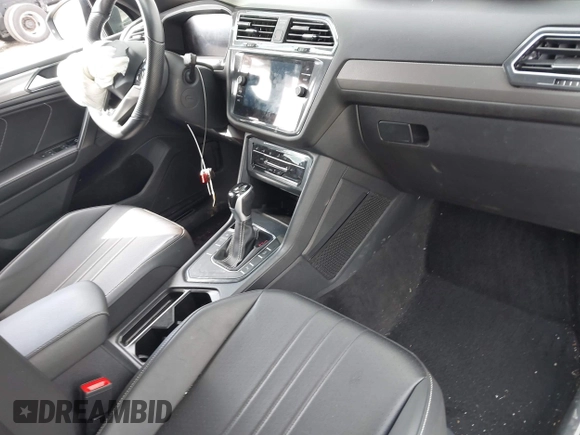 2023 Volkswagen Tiguan SE R-Line Black with VIN 3VVCB7AX1PM106543, listed as a IAAI auction lot 41784559 with 39,846 mi miles and . Bid and sale history available at DreamBid. Image 5.