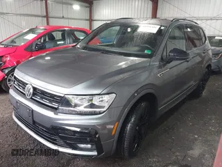 2021 Volkswagen Tiguan SE with VIN 3VV2B7AX0MM039117, listed as a IAAI auction lot 41991481 with 36,824 mi miles and . Bid and sale history available at DreamBid. Image 2.